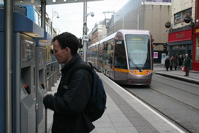 Colin buying tickets for Dublin trams - The Luas